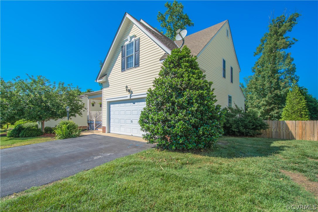 9330 Springmount Terrace Chesterfield, VA 23832 - Photo 3 of 38 front view of a house with a yard