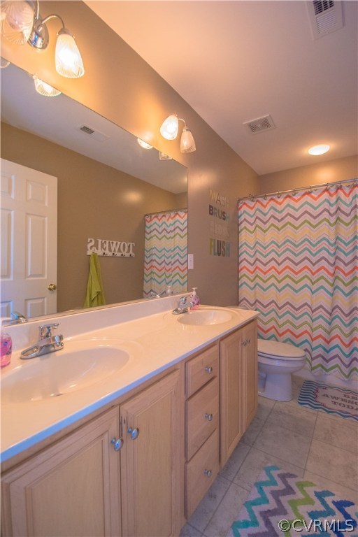 9330 Springmount Terrace Chesterfield, VA 23832 - Photo 32 of 38 a bathroom with a sink a vanity and a mirror