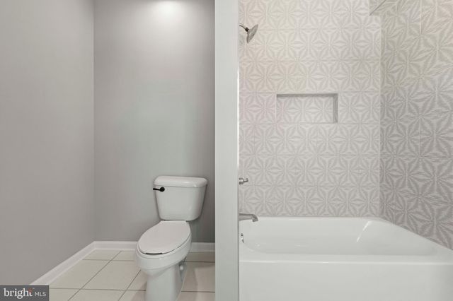 a front view of a house with a balcony