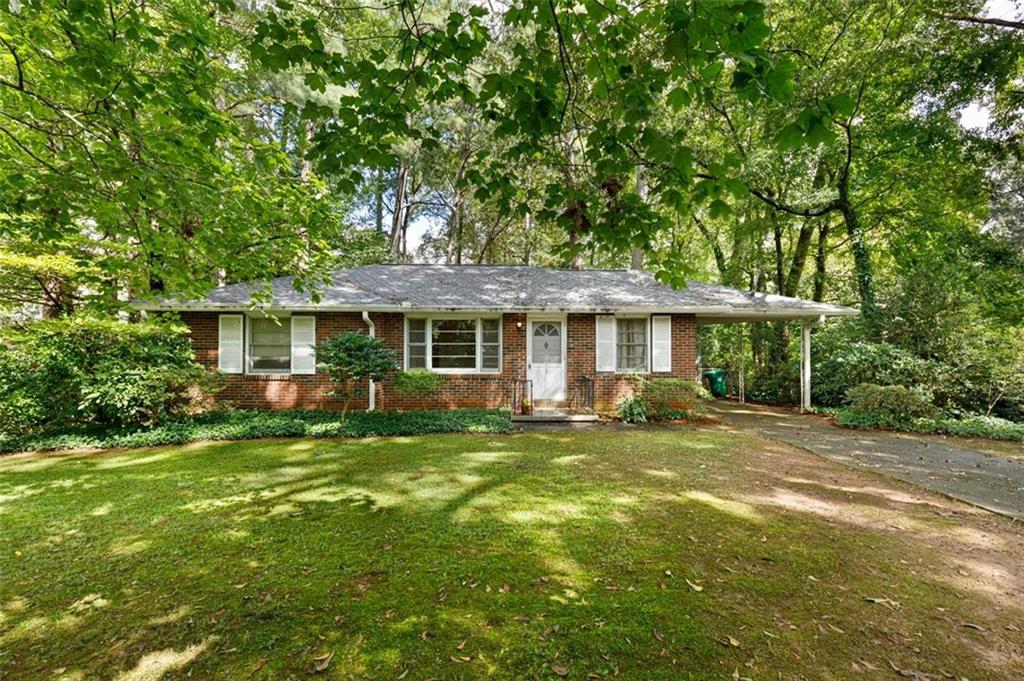 869 Wintergreen Lane Decatur, GA 30033 - Photo 1 of 1 Dappled sunlit front yard welcomes you home.