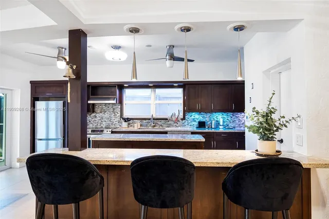 a bedroom with a bed and a television in it