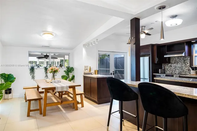 a bed room with a bed and a chair