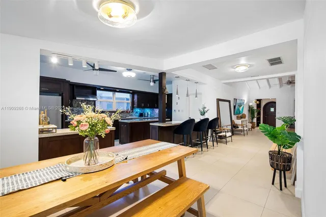 a bedroom with a bed and a chair