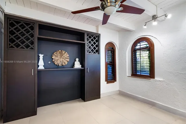 a view of a house with swimming pool and yard with furniture