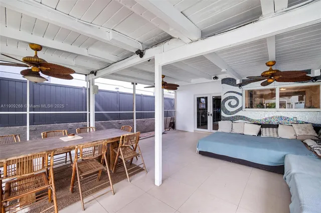 a view of a house with swimming pool and porch