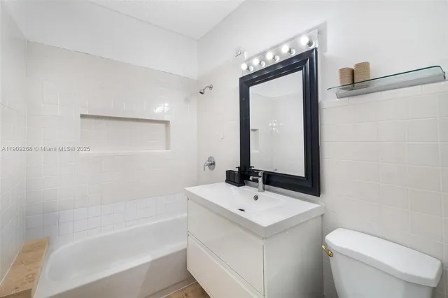 an aerial view of a house with swimming pool