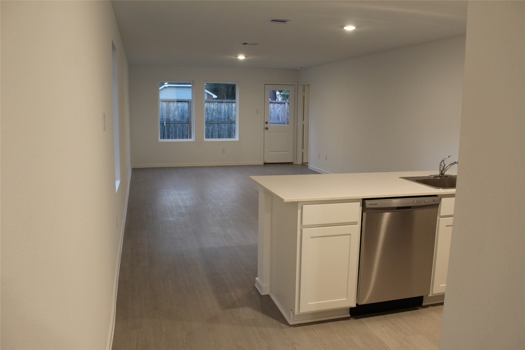 1733 Lofty Cedar Court Conroe, TX 77301 - Photo 5 of 18 a view of an empty room with a sink