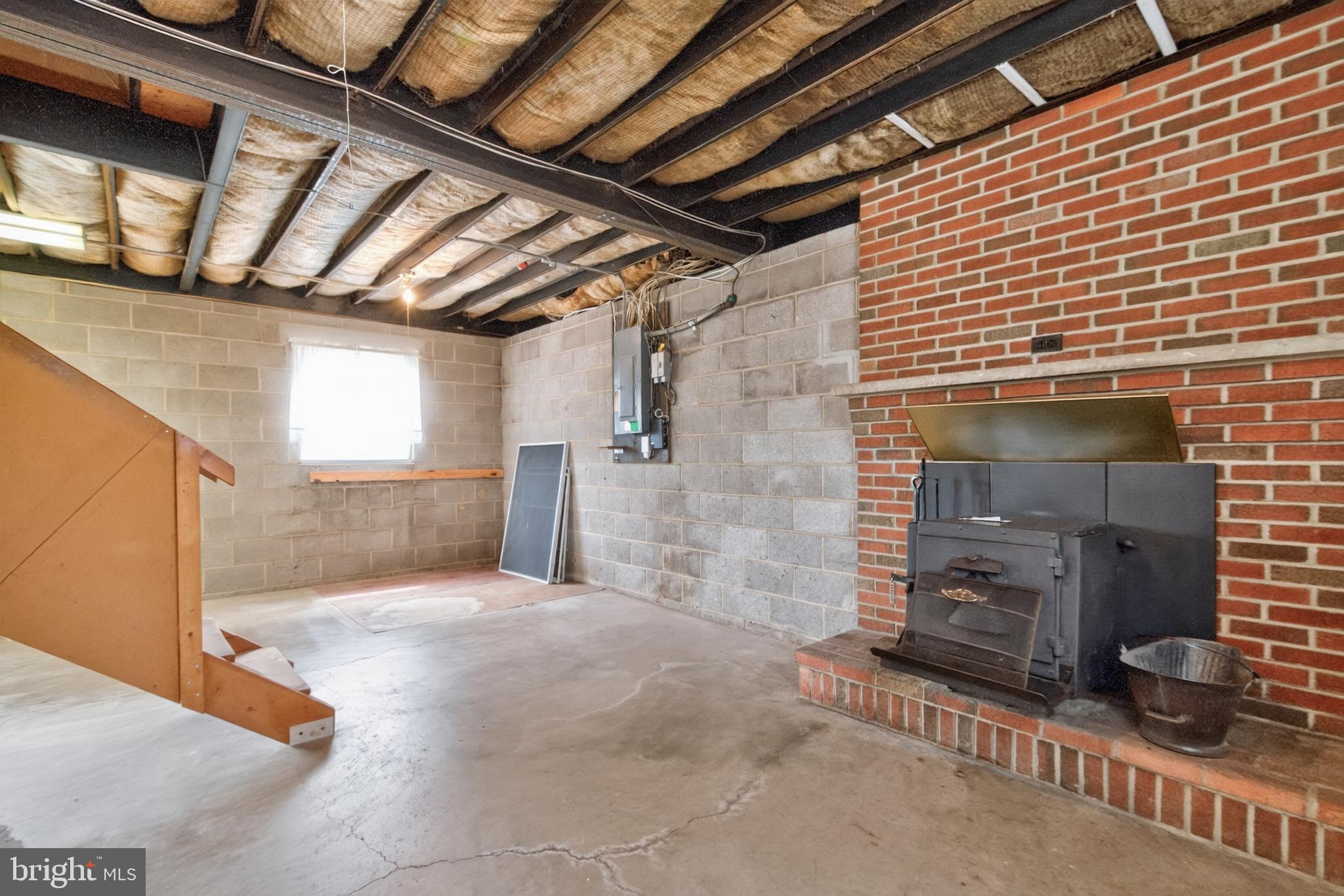 13835 Howard Road Dayton, MD 21036 - Photo 31 of 43 Lower level fireplace