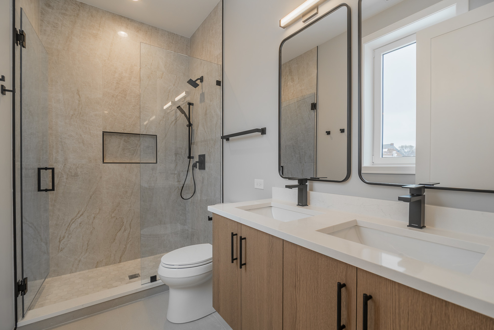 3738 South Calumet Avenue, Unit 2N Chicago, IL 60653 - Photo 12 of 21 a bathroom with a sink a toilet and shower