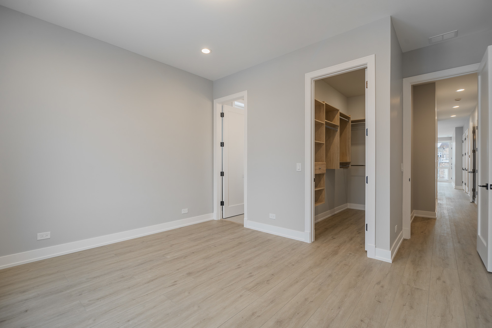 3738 South Calumet Avenue, Unit 2N Chicago, IL 60653 - Photo 9 of 21 wooden floor in an empty room