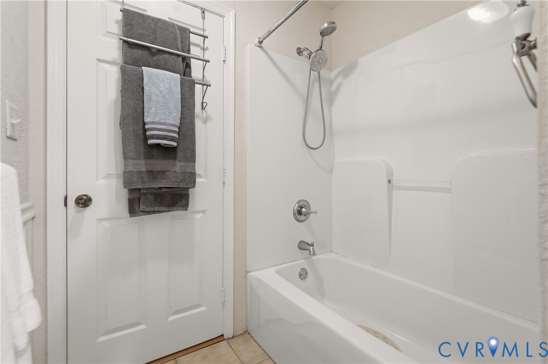 107 Oxford Road Hopewell, VA 23860 - Photo 34 of 50 White fiberglass tub and shower combination with c