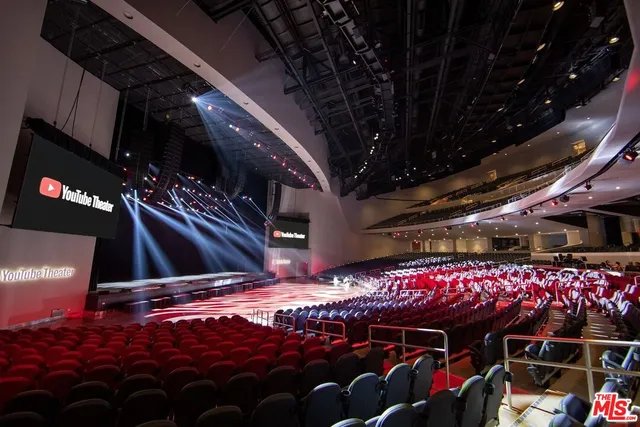 a view of swimming pool with outdoor seating