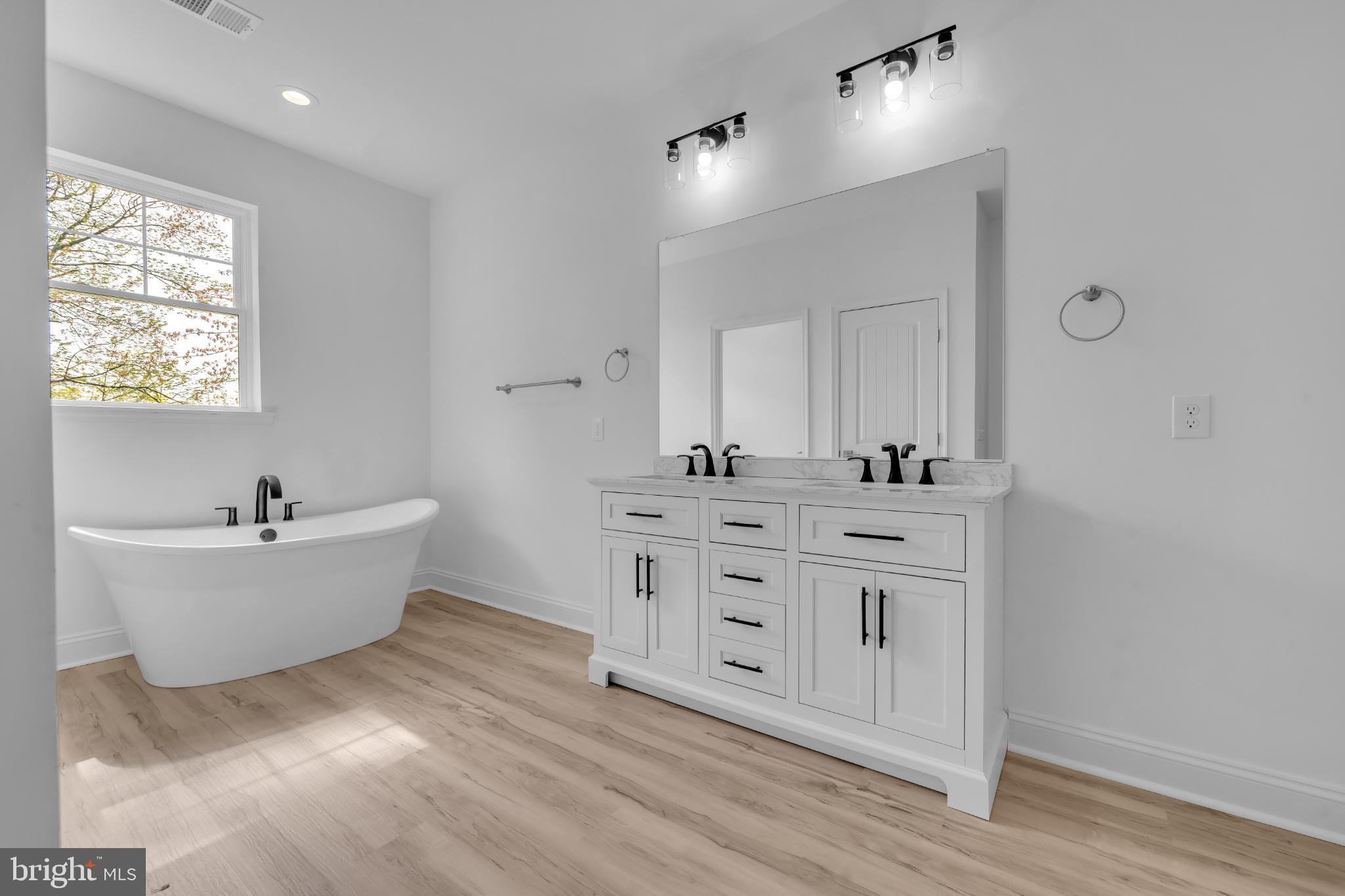 413 Trimble Road Joppa, MD 21085 - Photo 40 of 54 Elegant bathroom with modern fixtures.