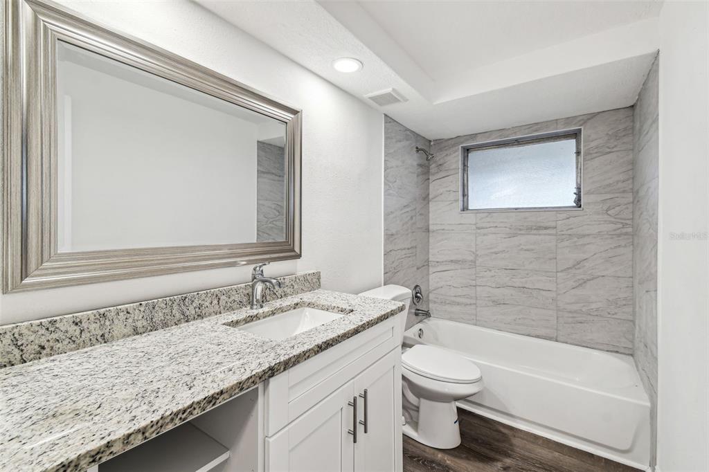 10837 Oldham Road Port Richey, FL 34668 - Photo 18 of 29 Main bathroom