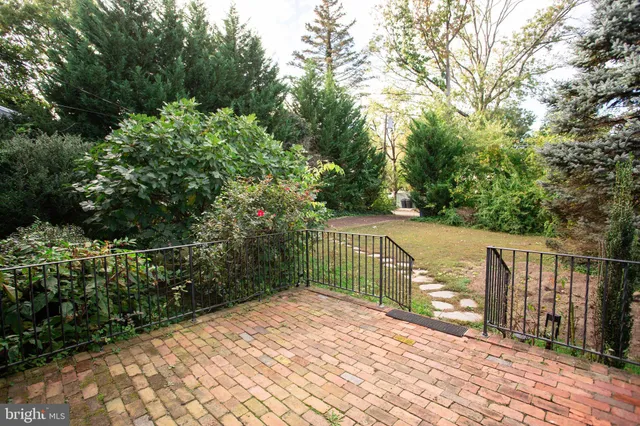 a view of balcony and yard