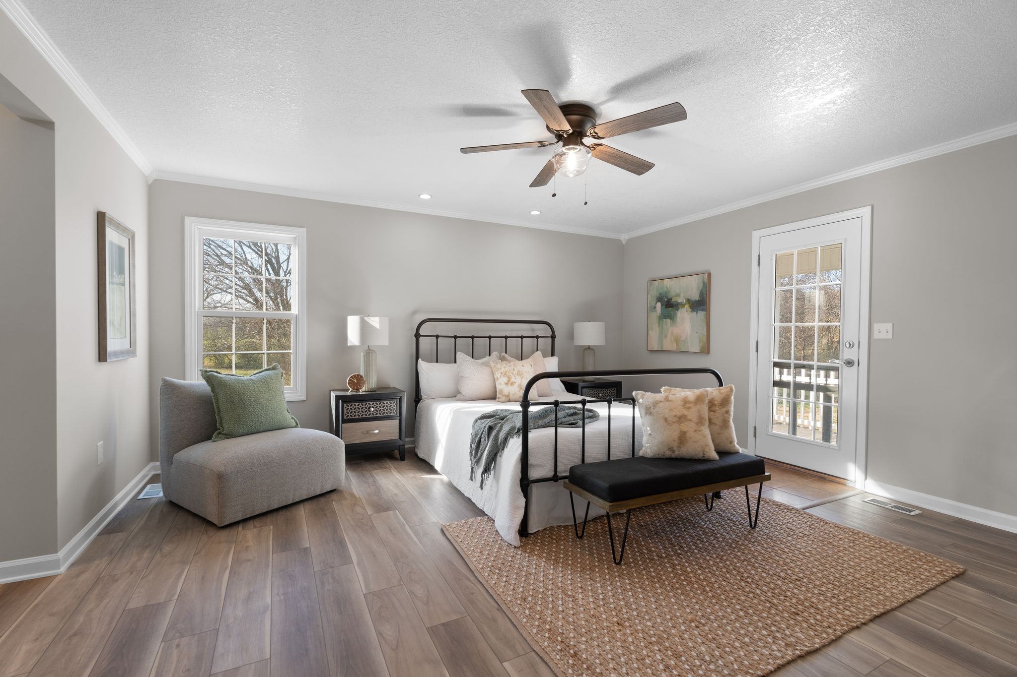 954 Newt Vanattia Road Hillsboro, TN 37342 - Photo 14 of 42 a bedroom with a bed and wooden floor