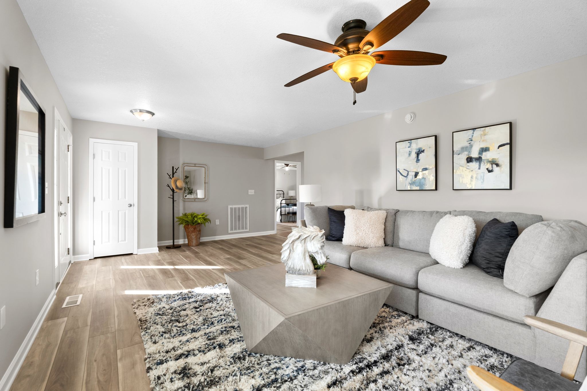954 Newt Vanattia Road Hillsboro, TN 37342 - Photo 6 of 42 a living room with furniture and a rug