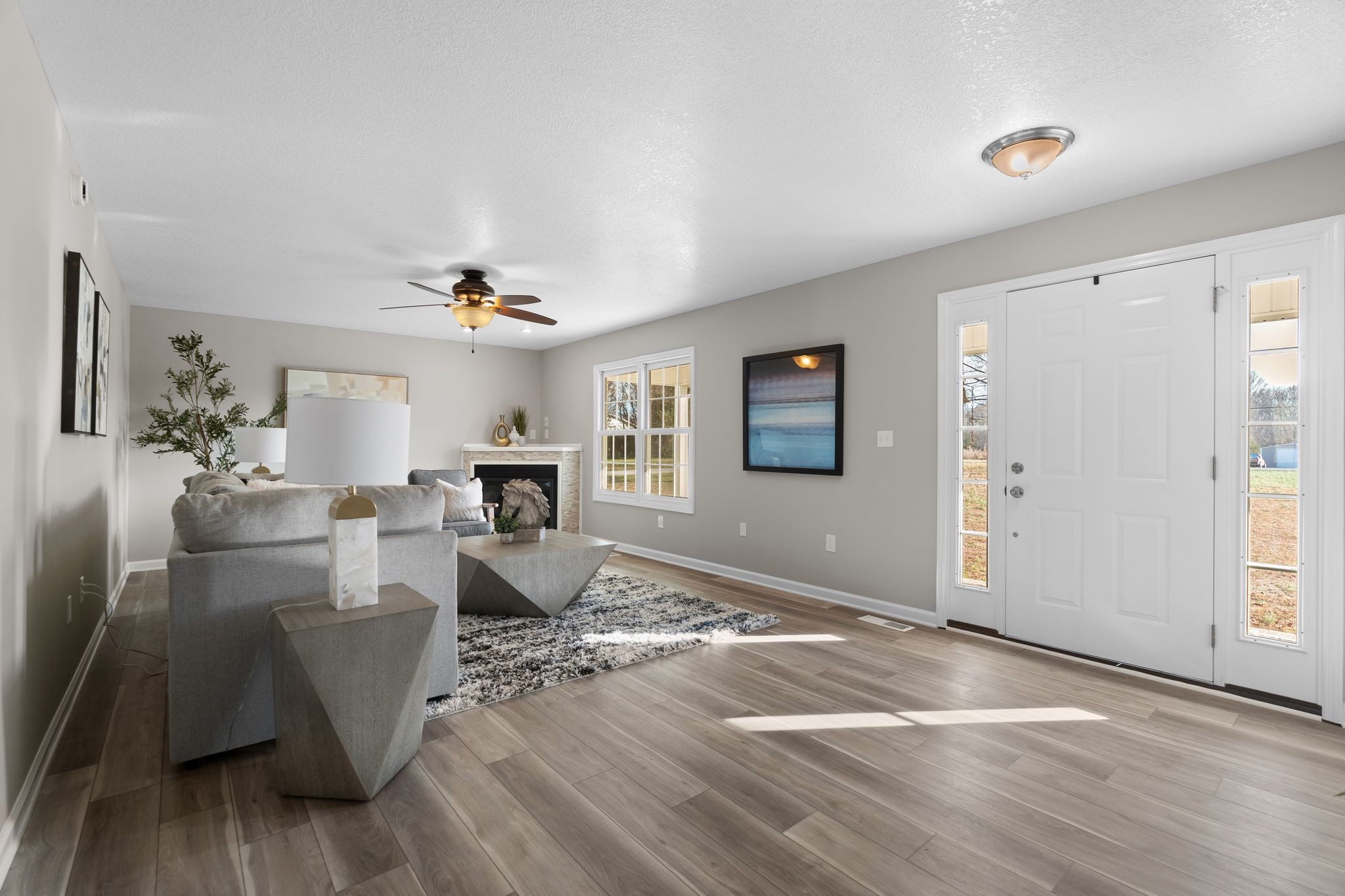 954 Newt Vanattia Road Hillsboro, TN 37342 - Photo 8 of 42 a living room with furniture and a chandelier