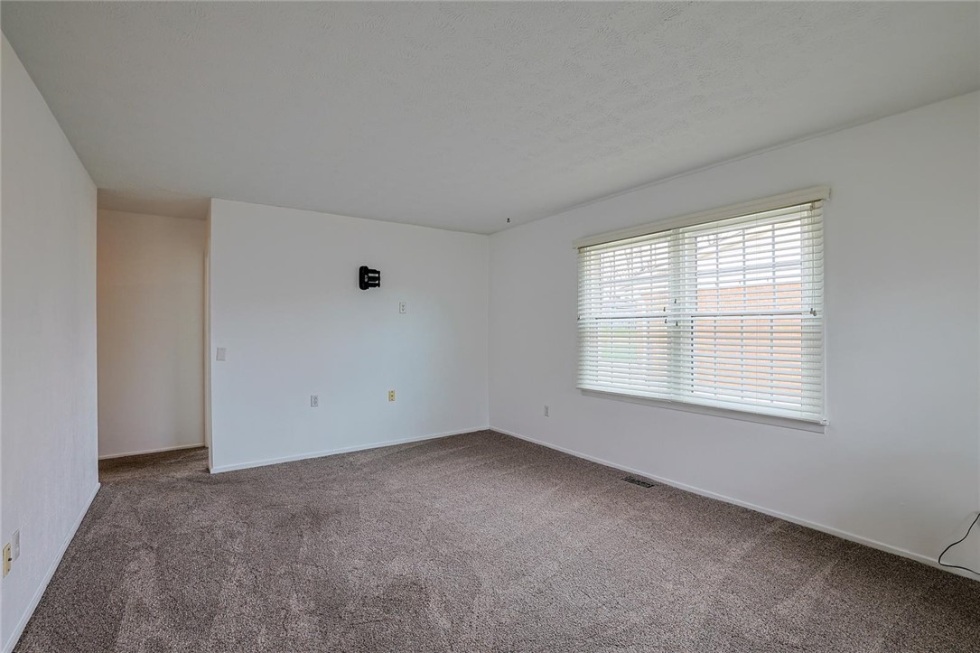 4307 Meadowcroft Road Dayton, OH 45429 - Photo 7 of 26 This versatile room offers a comfortable space with abundant natural light.