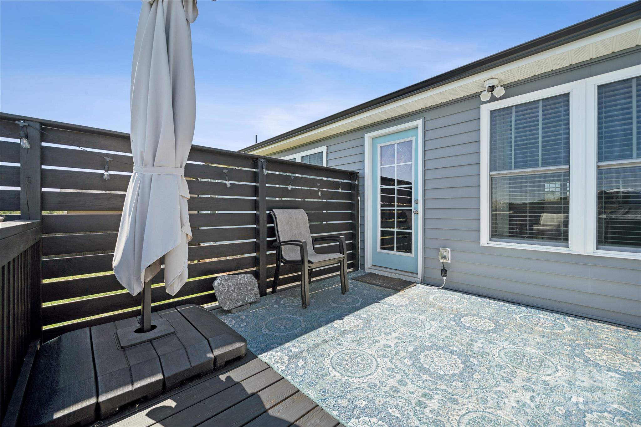 142 Alf Hoover Road Lincolnton, NC 28092 - Photo 34 of 40 a balcony view with two chairs and a table