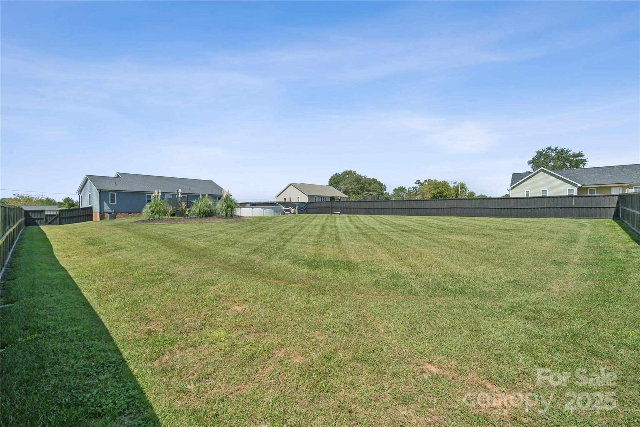 142 Alf Hoover Road Lincolnton, NC 28092 - Photo 38 of 40 a view of a field with an ocean view