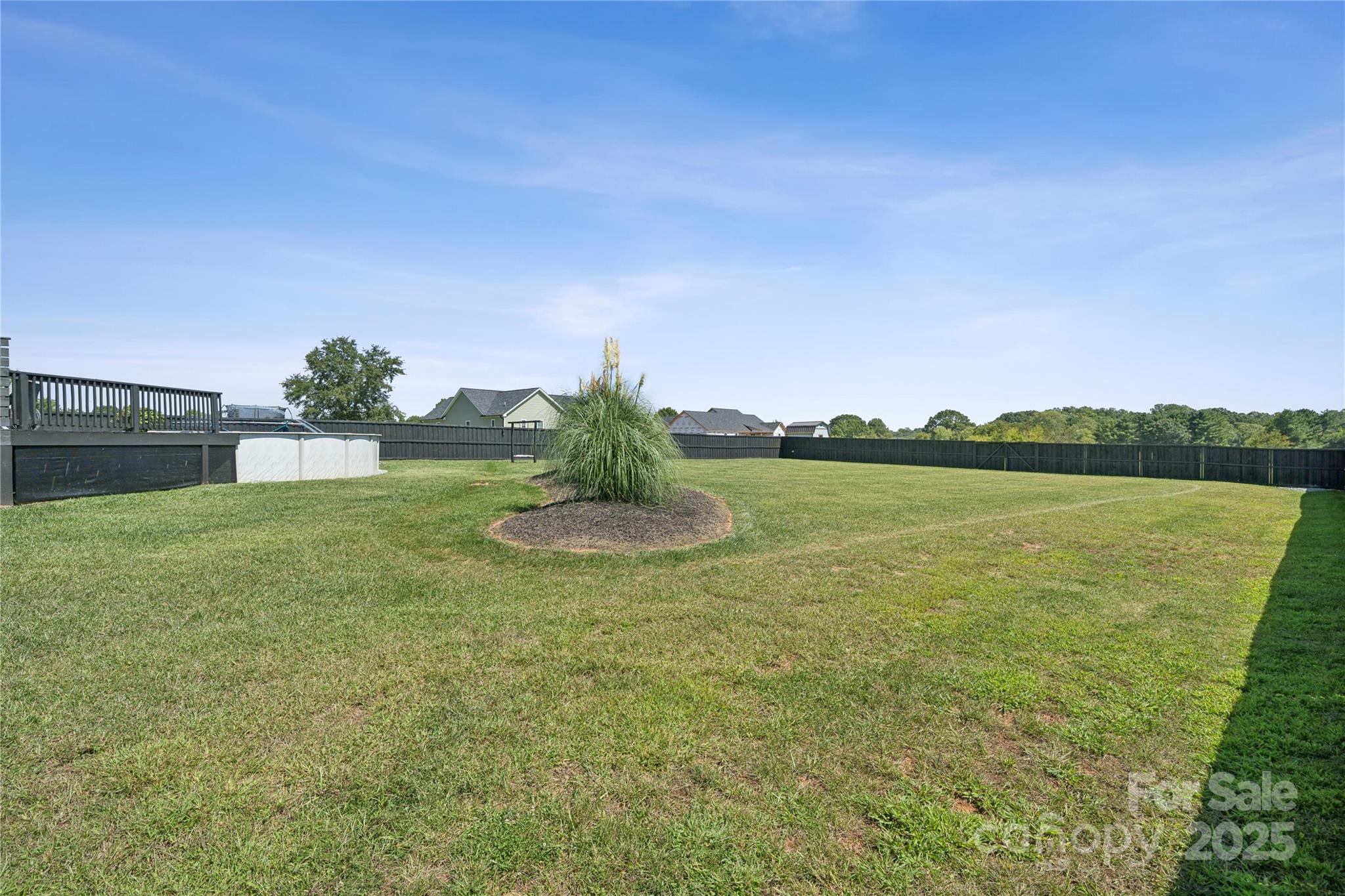 142 Alf Hoover Road Lincolnton, NC 28092 - Photo 39 of 40 a view of a lake with a big yard