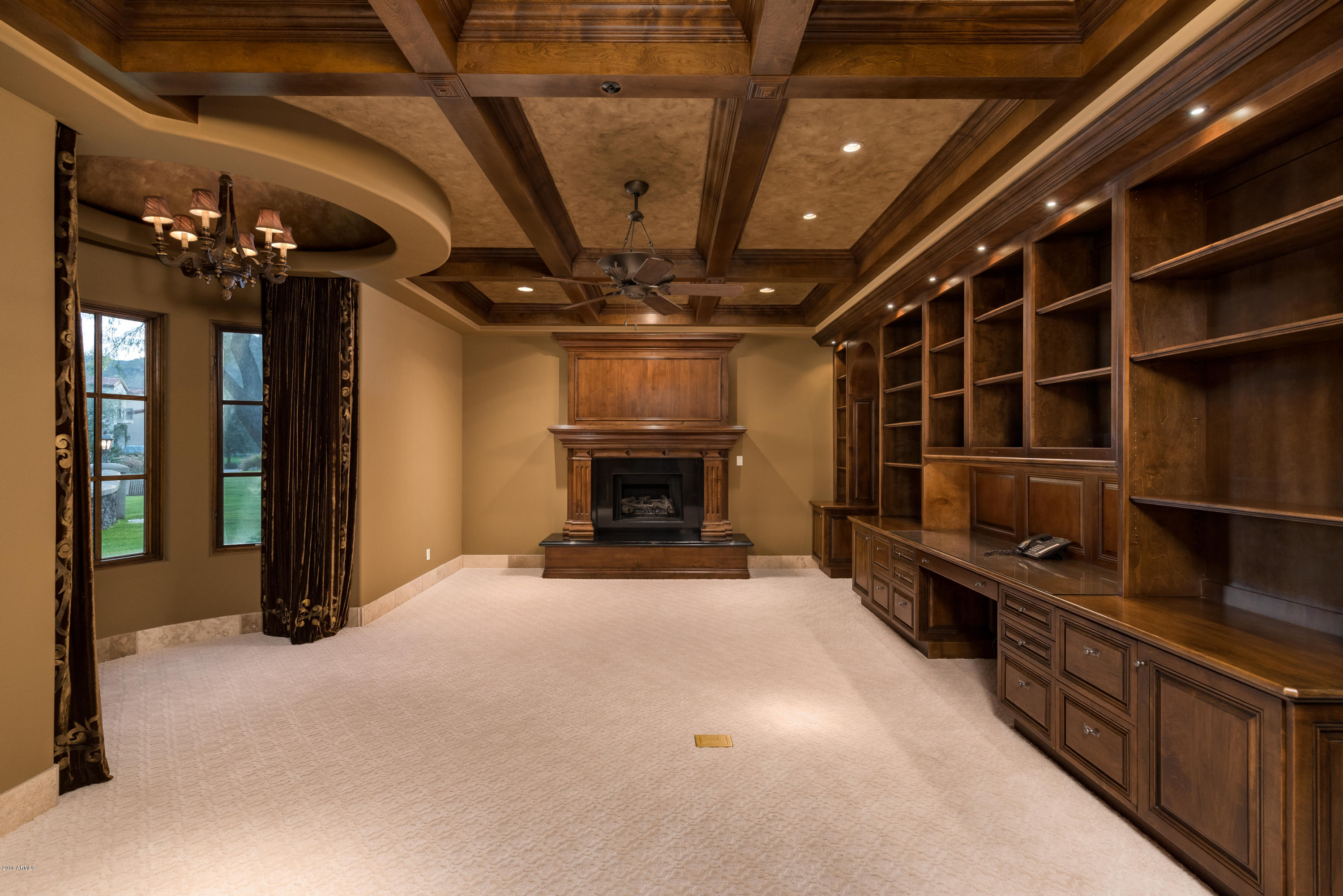 6390 East Royal Palm Road Paradise Valley, AZ 85253 - Photo 20 of 58 a view of an empty room with a fireplace
