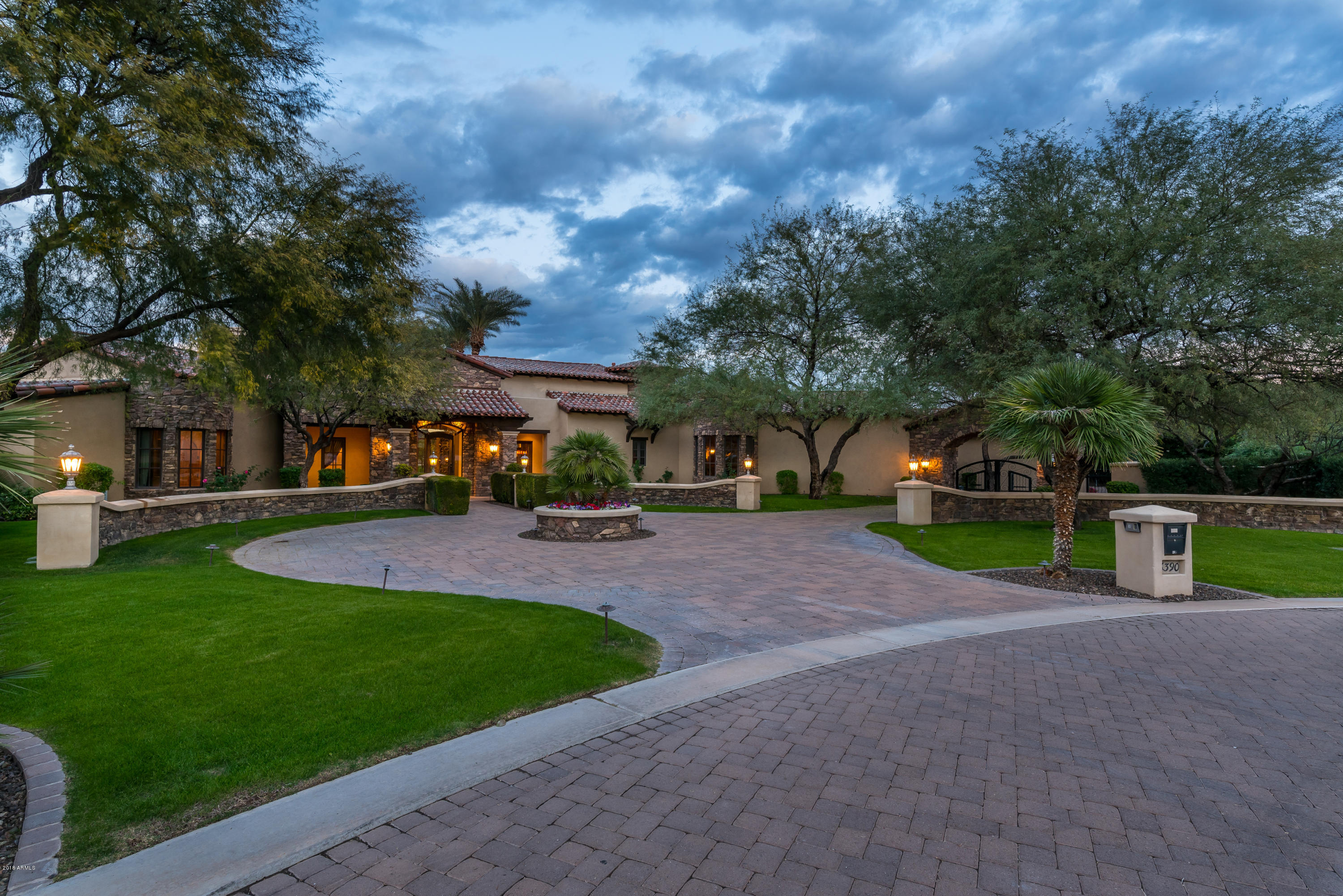 6390 East Royal Palm Road Paradise Valley, AZ 85253 - Photo 3 of 58 a view of a house with a big yard