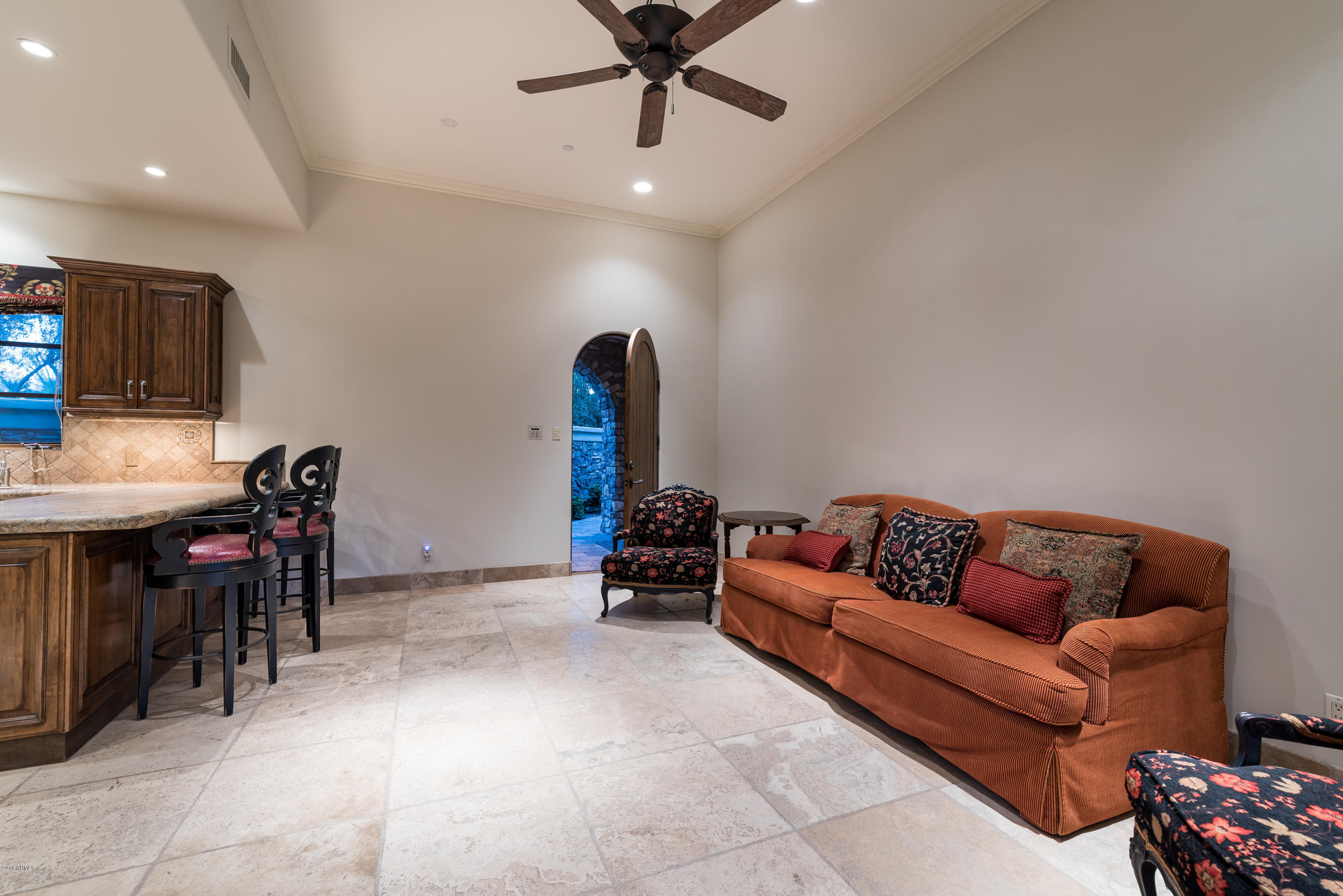 6390 East Royal Palm Road Paradise Valley, AZ 85253 - Photo 31 of 58 a living room with furniture and a flat screen tv