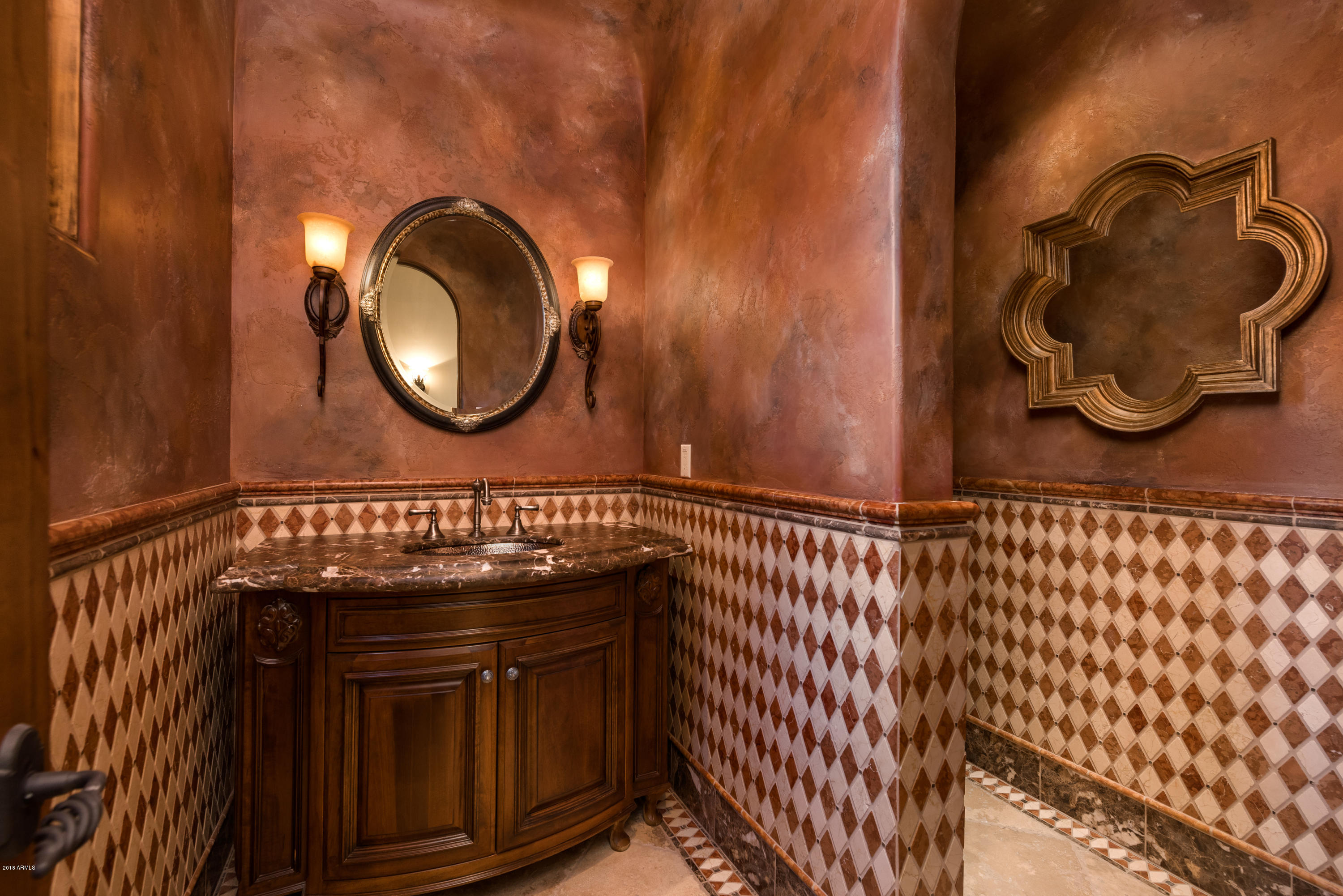 6390 East Royal Palm Road Paradise Valley, AZ 85253 - Photo 38 of 58 a bathroom with a sink and a mirror