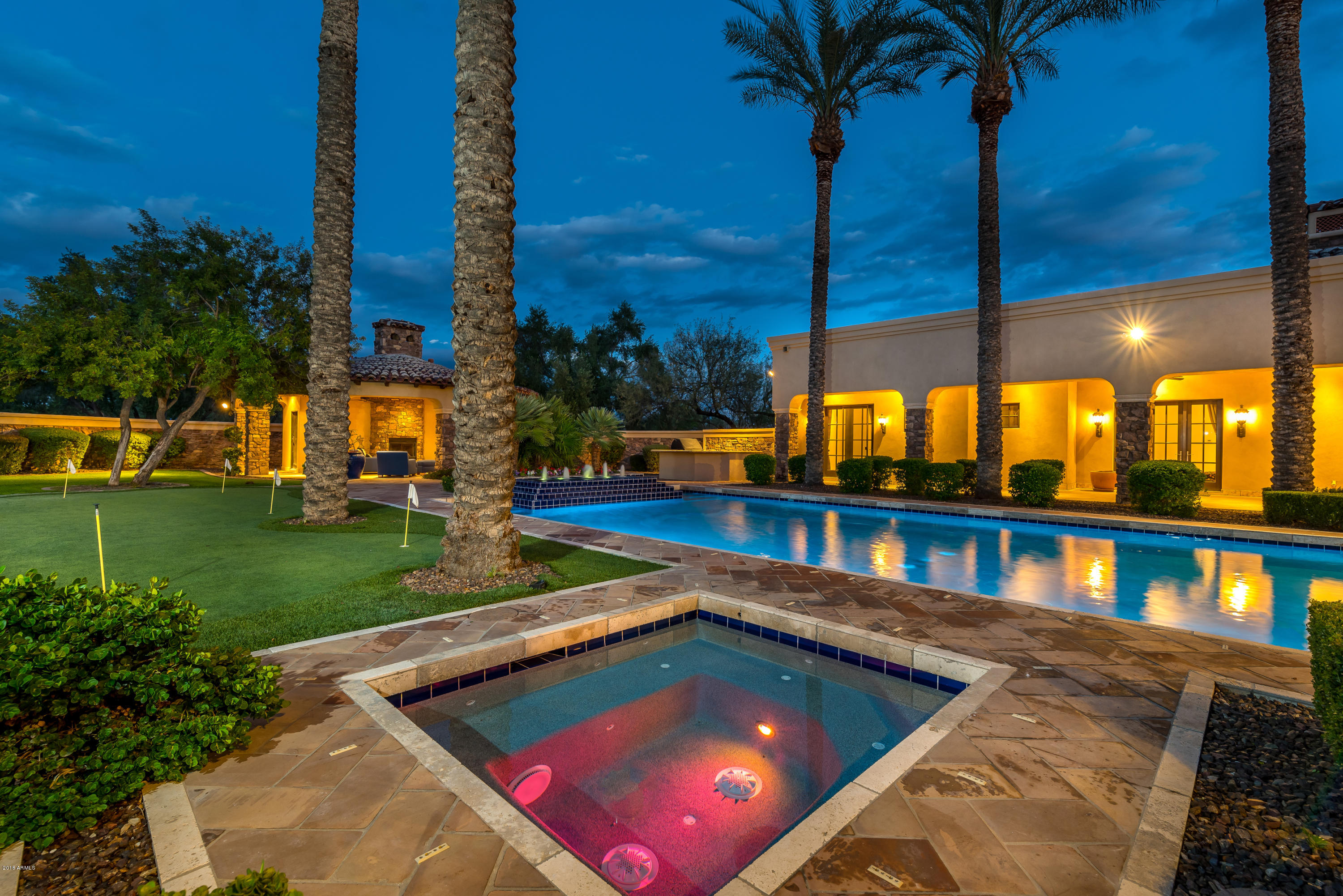 6390 East Royal Palm Road Paradise Valley, AZ 85253 - Photo 39 of 58 a view of a house with a swimming pool