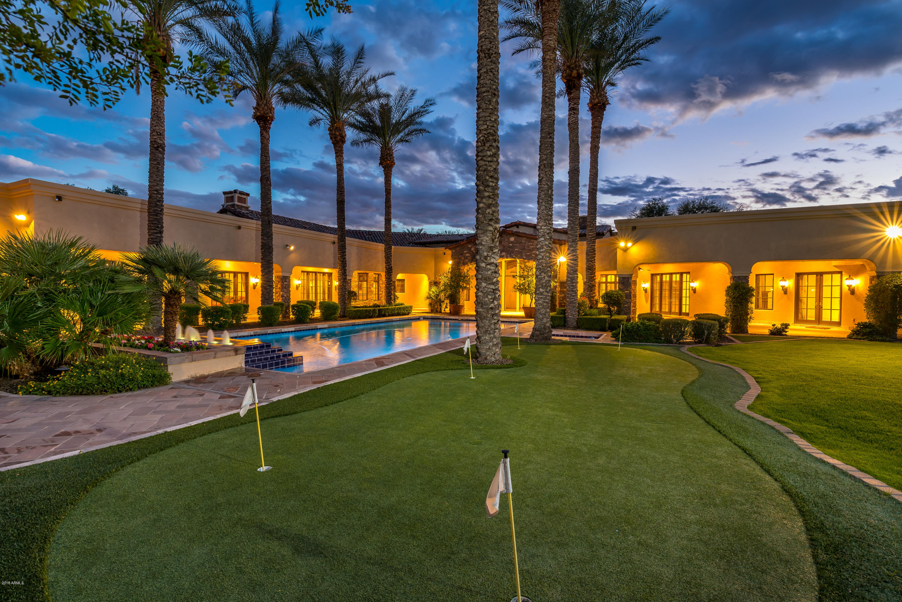6390 East Royal Palm Road Paradise Valley, AZ 85253 - Photo 40 of 58 a view of a golf course with a lake
