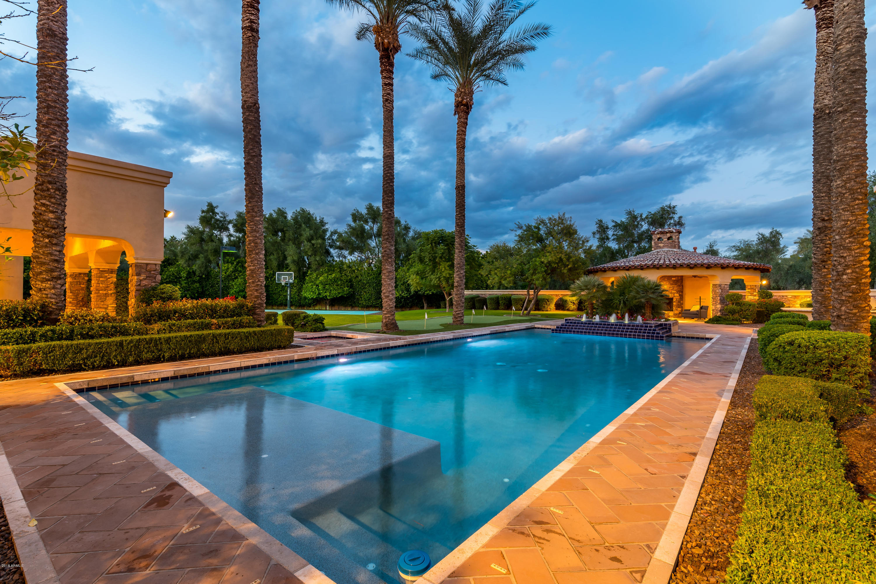 6390 East Royal Palm Road Paradise Valley, AZ 85253 - Photo 41 of 58 a view of swimming pool with a lounge chairs