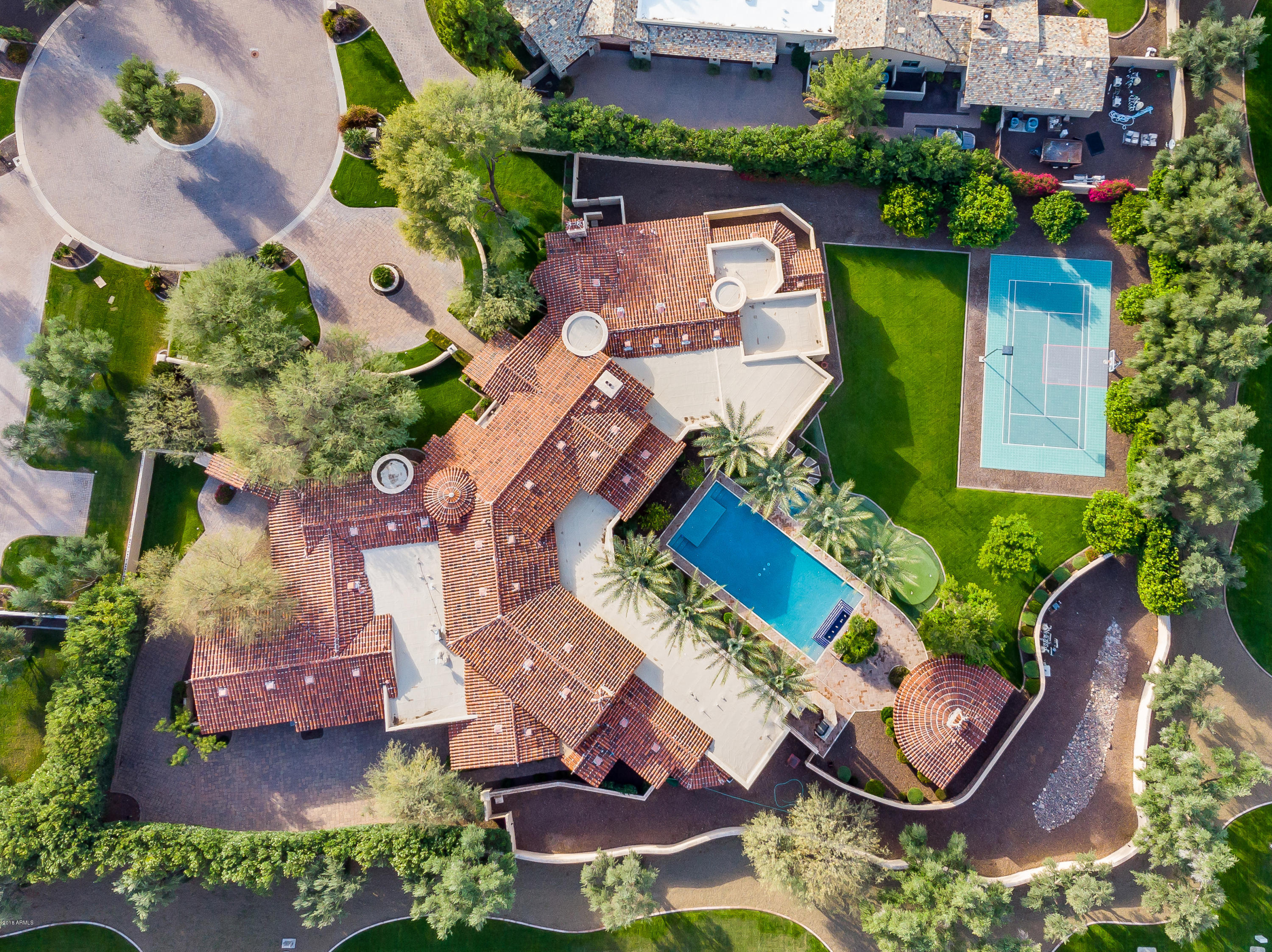 6390 East Royal Palm Road Paradise Valley, AZ 85253 - Photo 51 of 58 an aerial view of a house with garden space and a street view