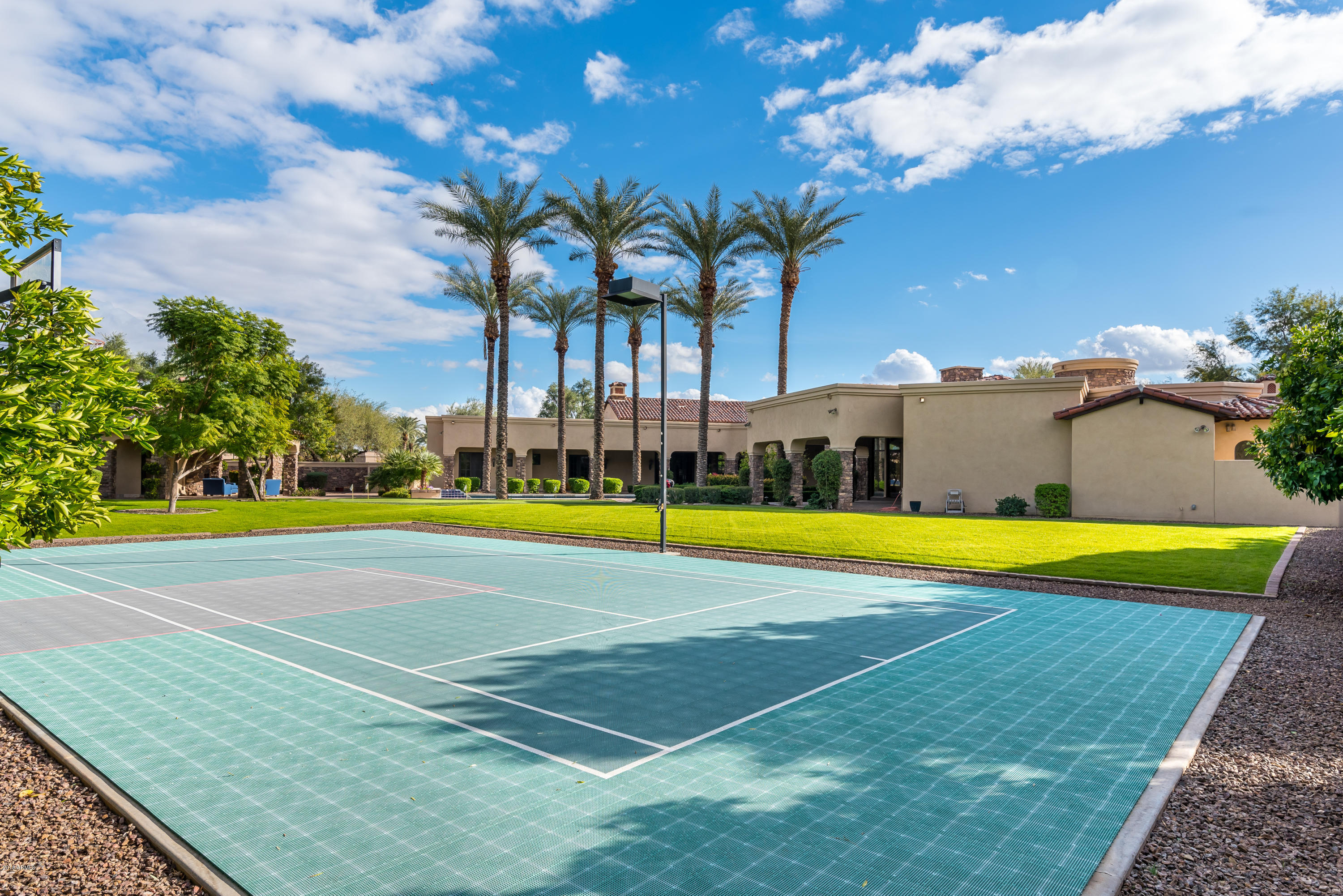 6390 East Royal Palm Road Paradise Valley, AZ 85253 - Photo 55 of 58 a view of a swimming pool with an outdoor space and seating area