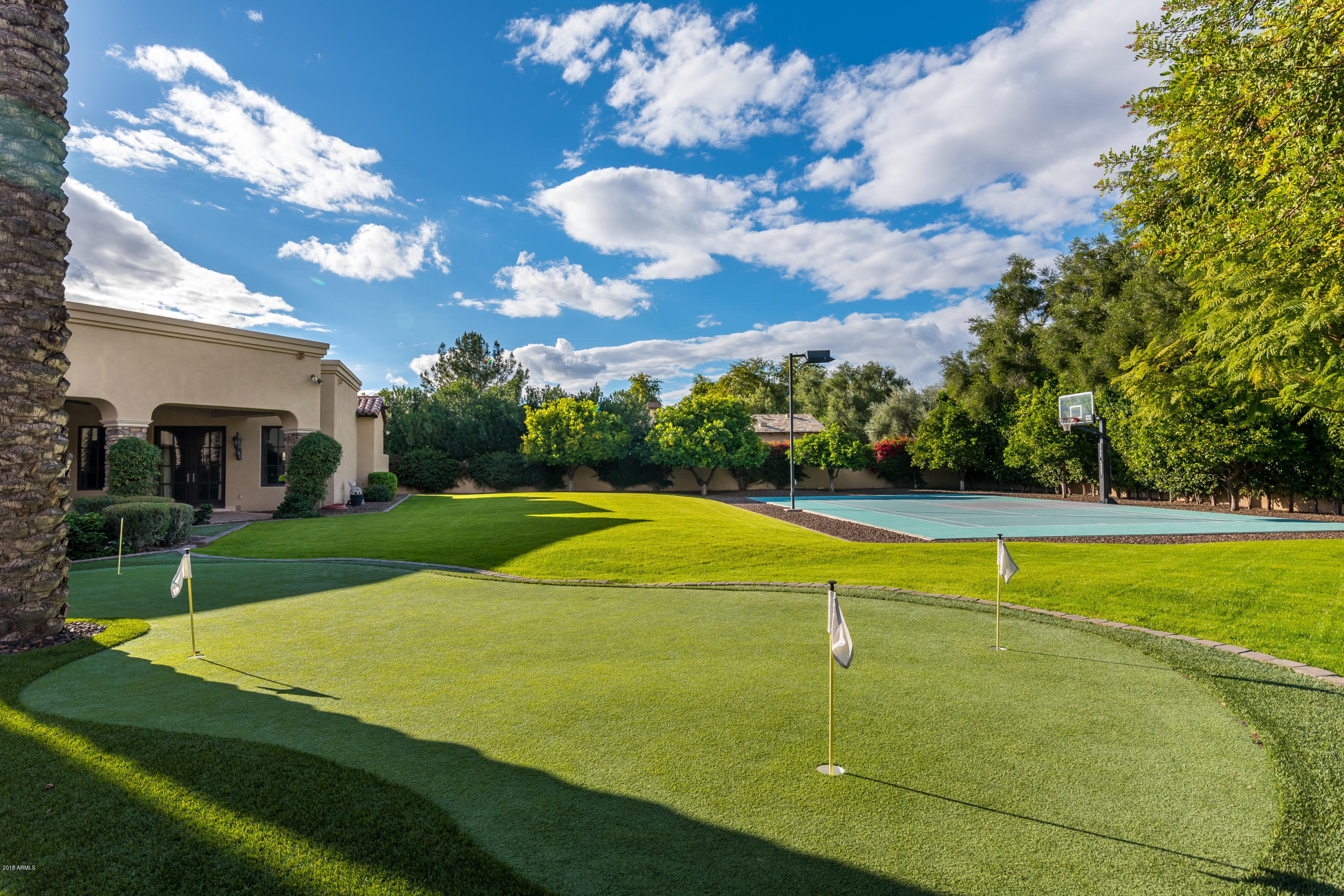 6390 East Royal Palm Road Paradise Valley, AZ 85253 - Photo 56 of 58 a view of a playground with basketball court