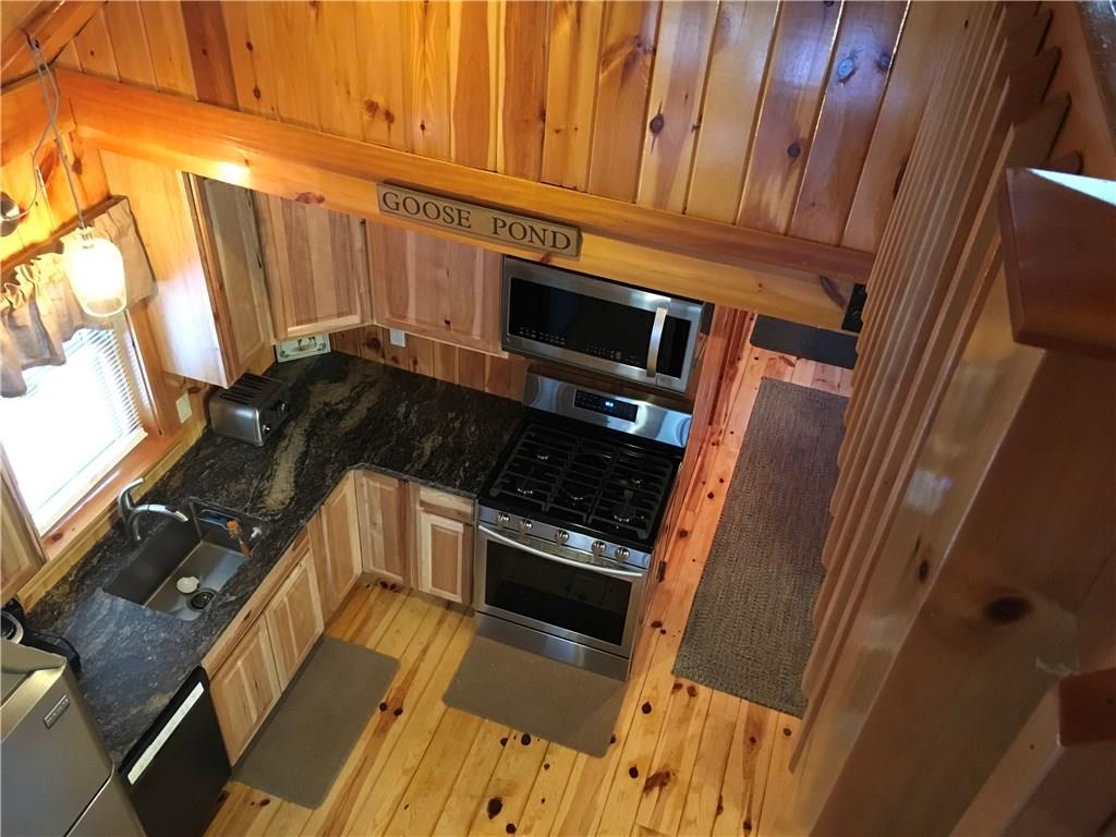 51 Kettle Pond Road, Unit 7 Shapleigh, ME 04076 - Photo 5 of 24 View of kitchen from the catwalk