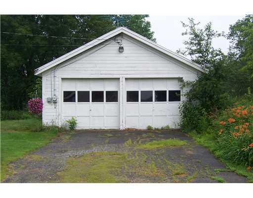 43 Augusta Road Belmont, ME 04952 - Photo 1 of 5 Exterior Front. Garage on 5.45 acres...