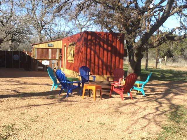 a view of a chairs in patio