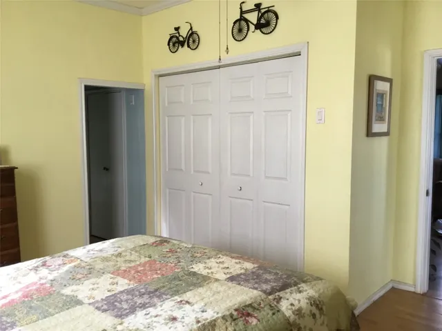 a room with furniture and a flat screen tv