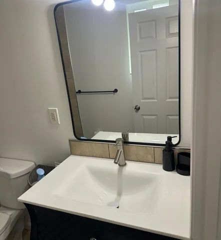 a view of a park with swings and slides