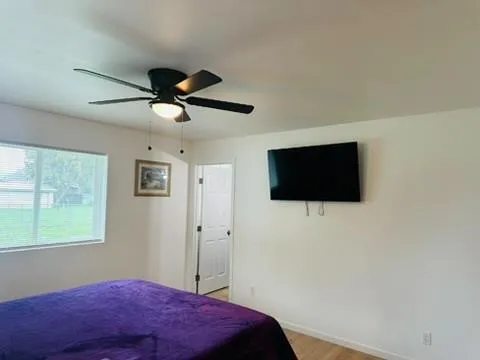 a kitchen with a sink appliances and cabinets