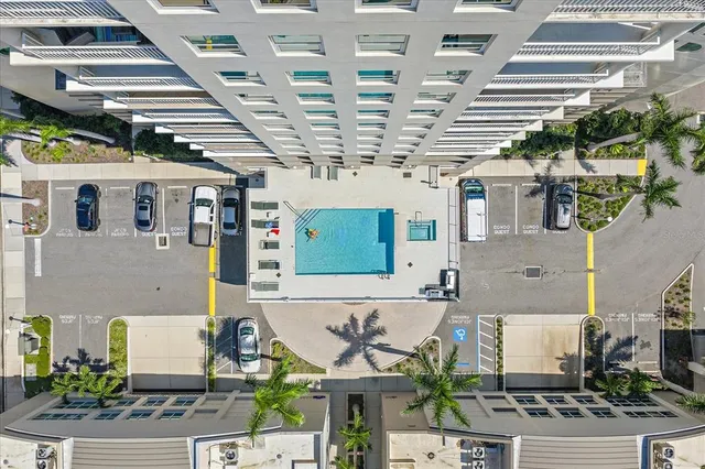 an aerial view of a house with a garden
