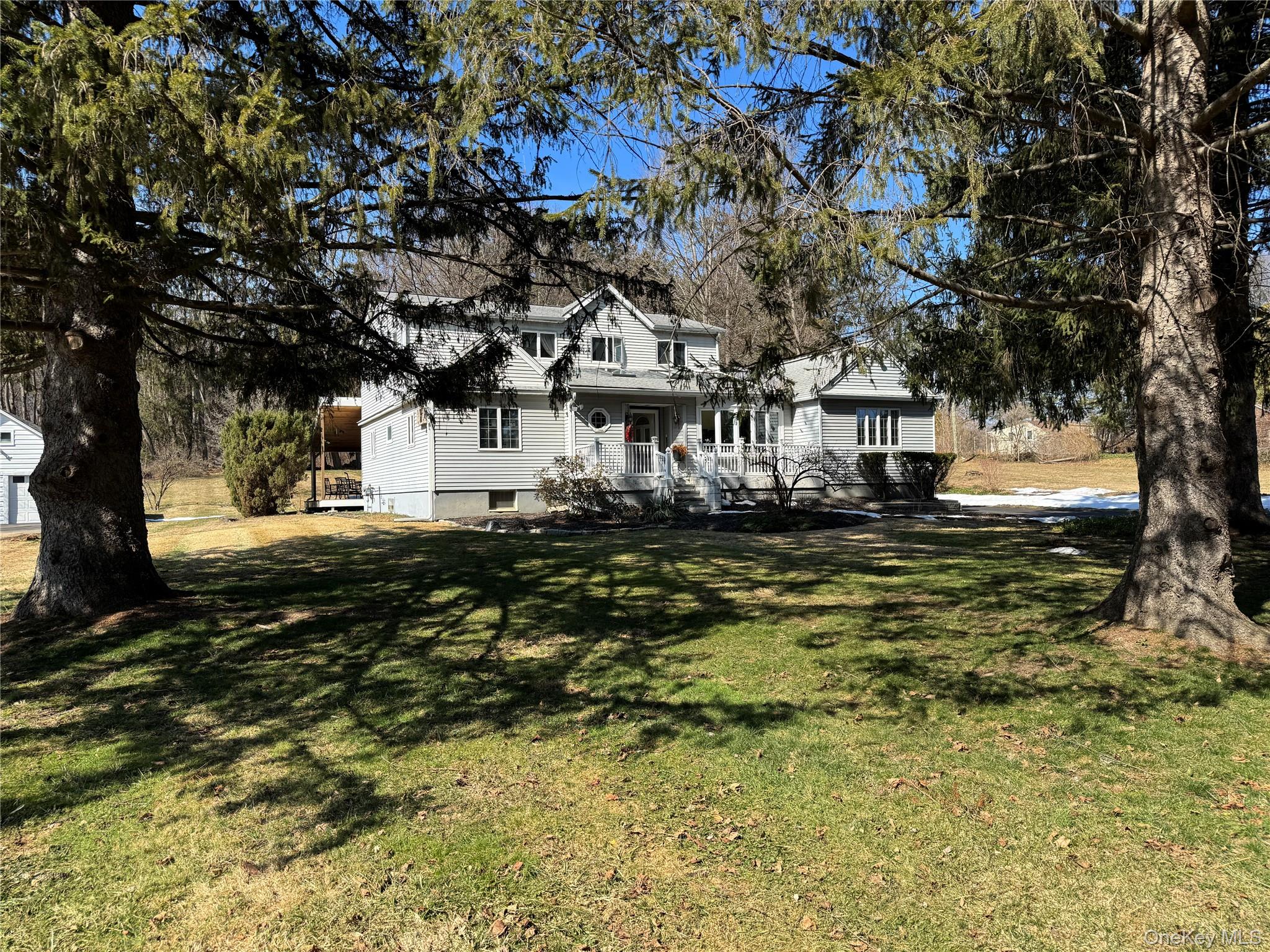 680 Vassar Road Poughkeepsie, NY 12603 - Photo 20 of 21 a large tree in front of a house