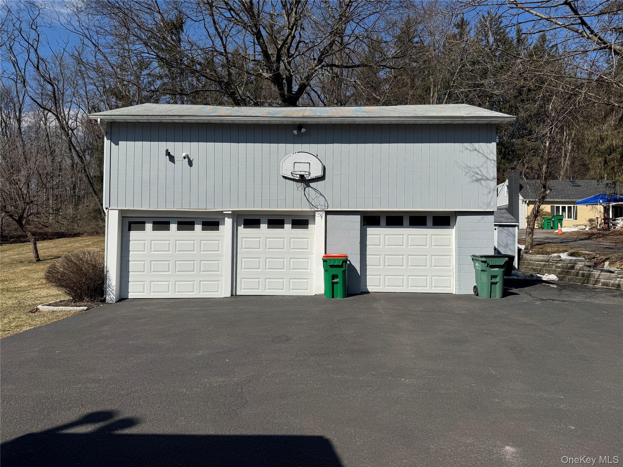 680 Vassar Road Poughkeepsie, NY 12603 - Photo 21 of 21 a front view of a house with a yard and garage