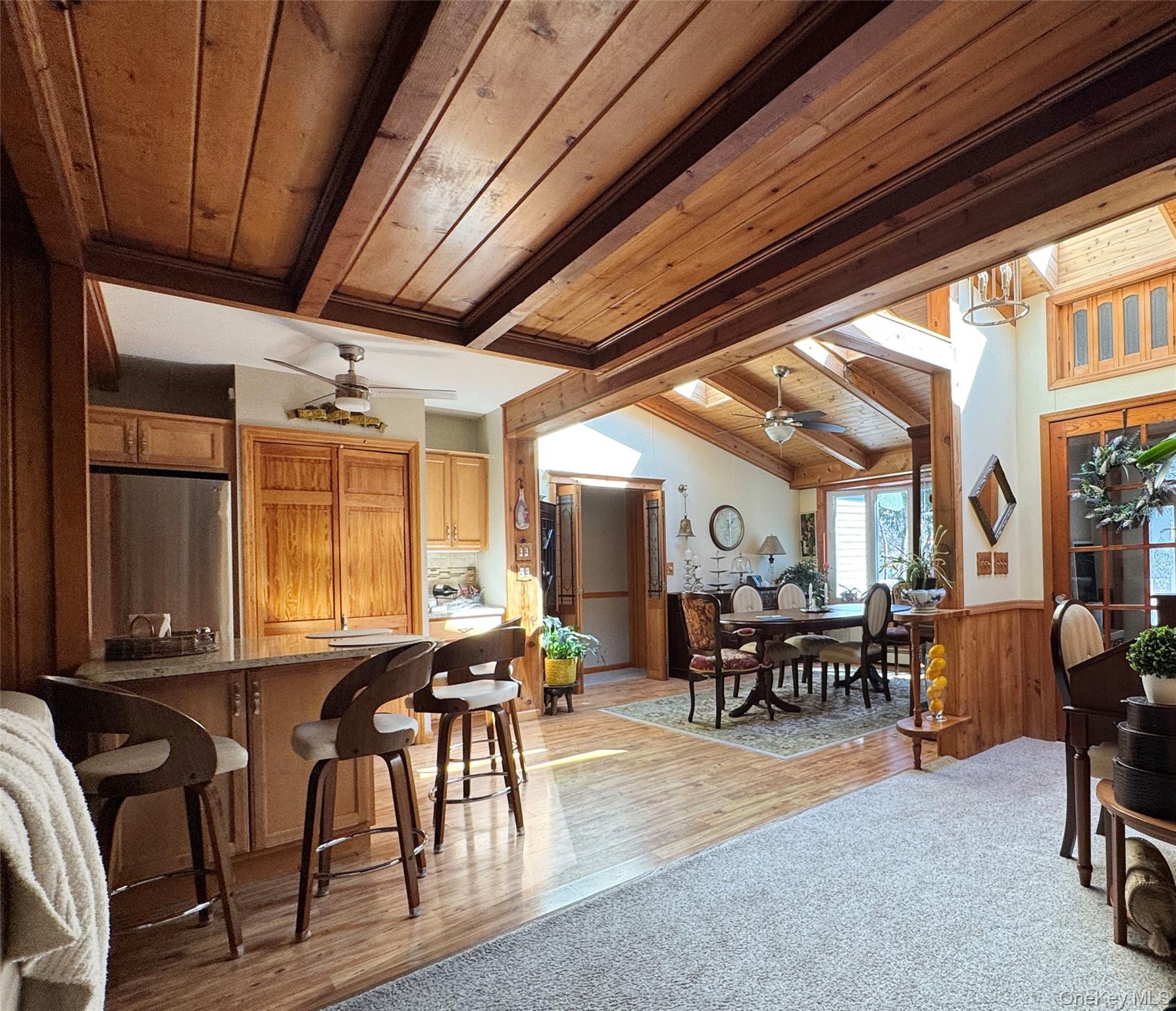 680 Vassar Road Poughkeepsie, NY 12603 - Photo 4 of 21 a view of a dining room with furniture window and outside view
