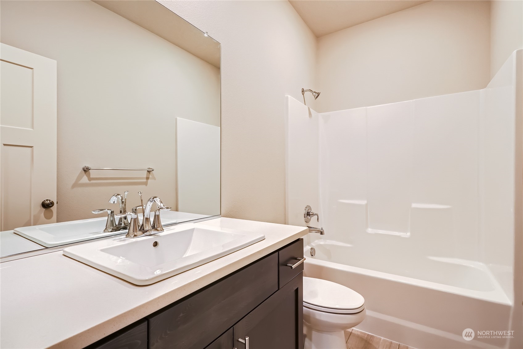 2811 South 6th Way Ridgefield, WA 98642 - Photo 8 of 24 a bathroom with a sink a toilet and shower
