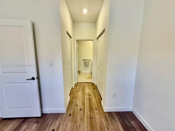 a view of a room with racks on the wall