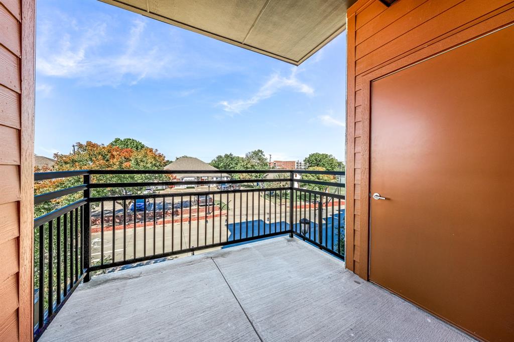 3522 Main Street, Unit 212 Rowlett, TX 75088 - Photo 15 of 25 a view of a balcony with an outdoor space