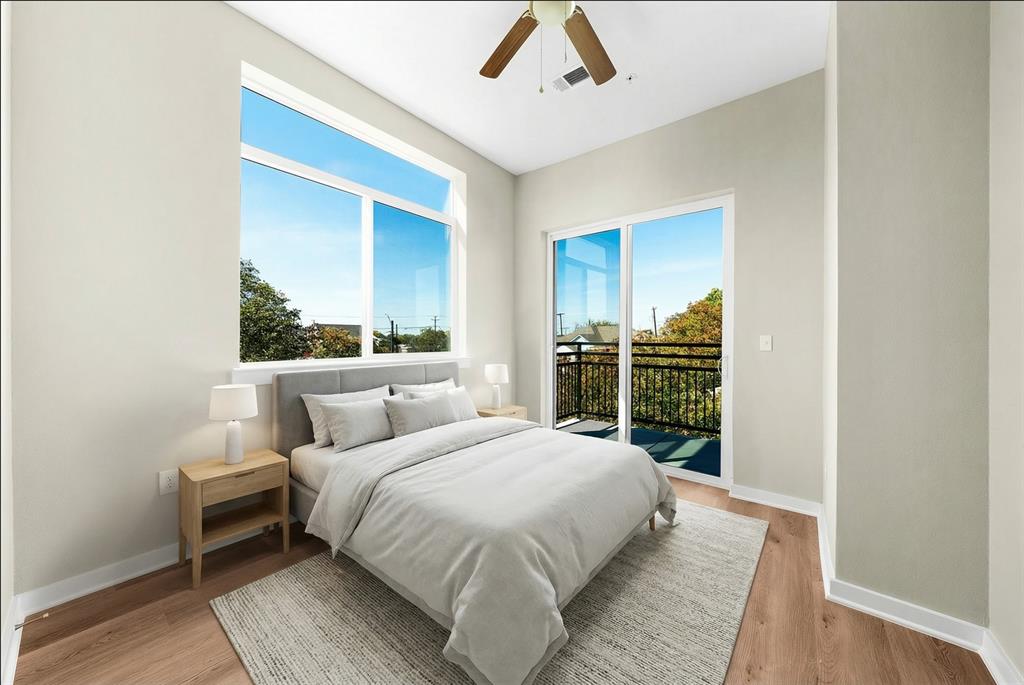 a bed room with a bed and a window